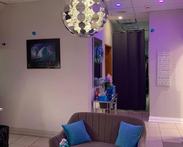 comfortable waiting reception lounge at dental clinic near you