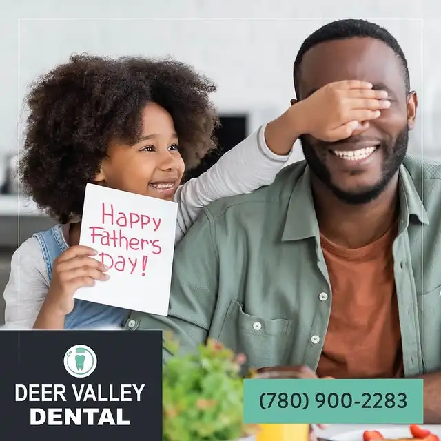 man and children smiling together outdoors showing healthy teeth at dentist near you