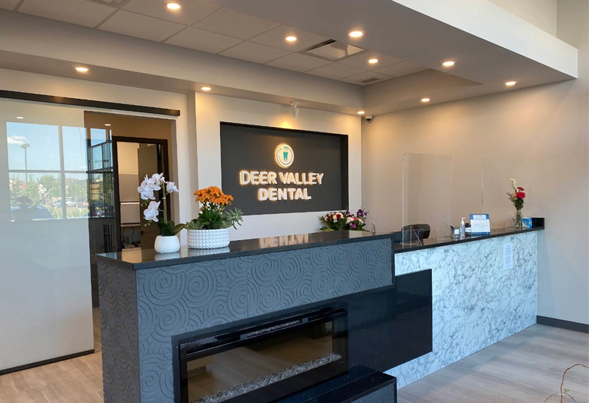 modern reception counter and office entrance at dentist in leduc, ab