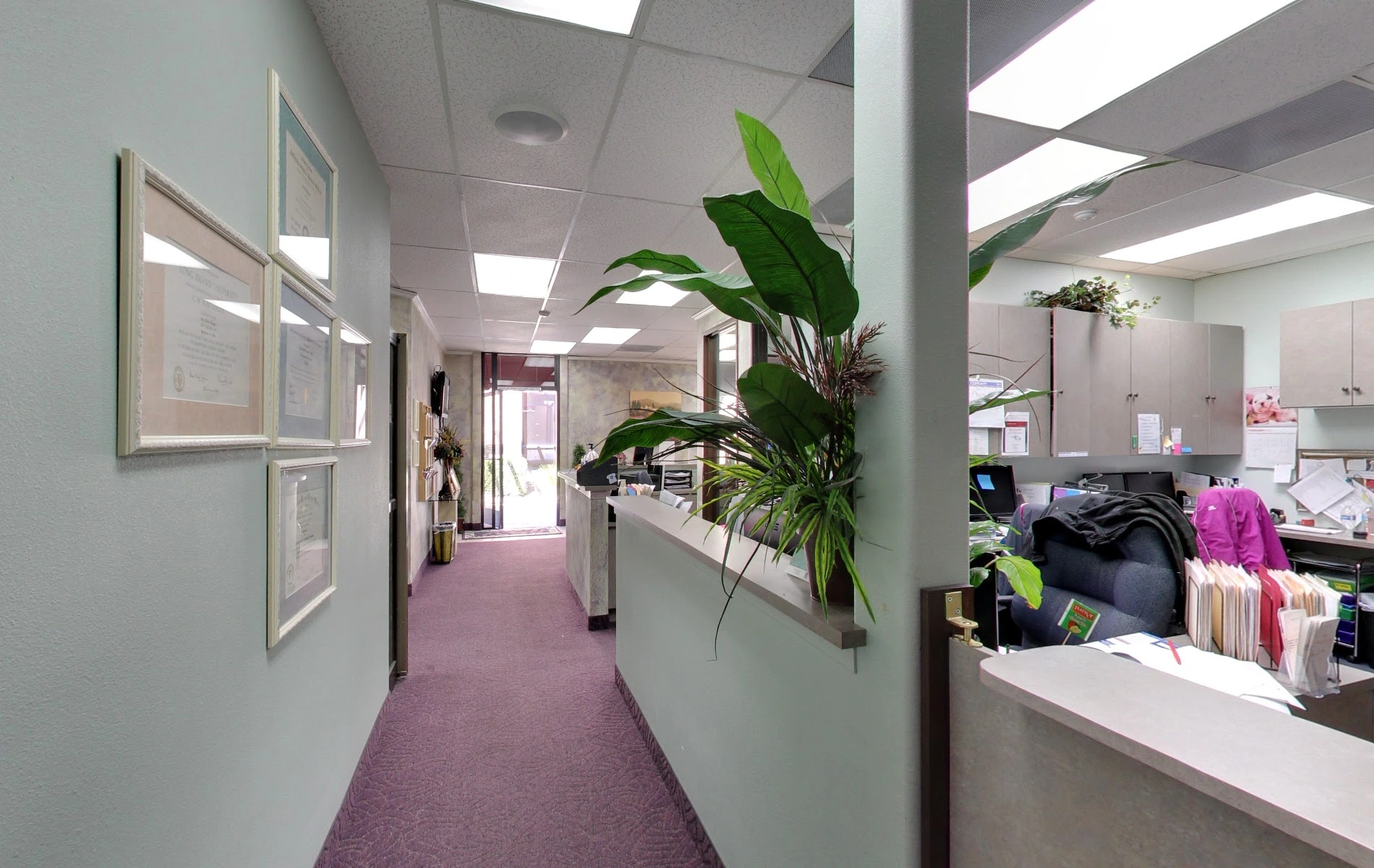 bright hallway leading to treatment rooms at podiatrist office near you