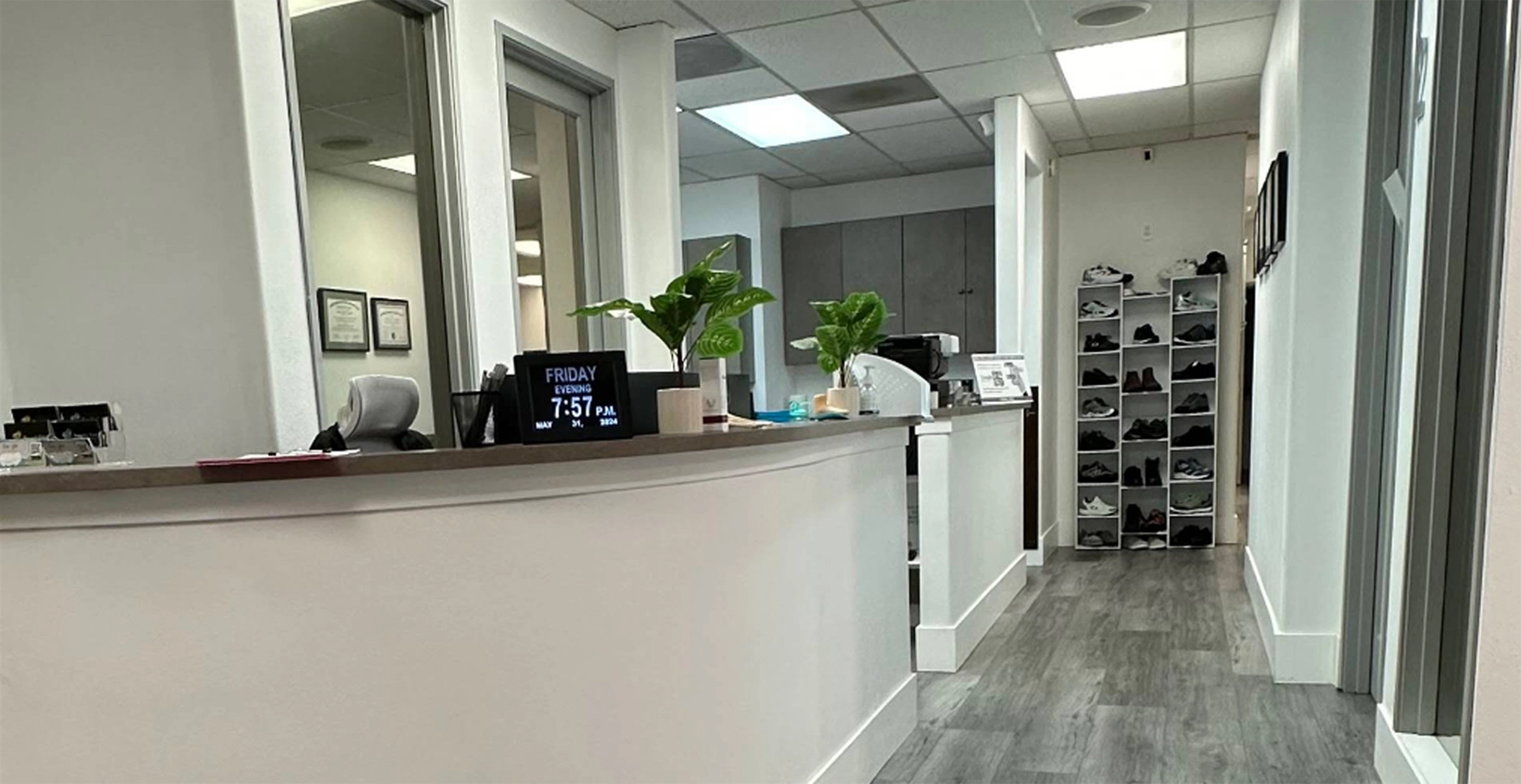 modern reception counter and hallway interior at podiatrist office in upland, ca