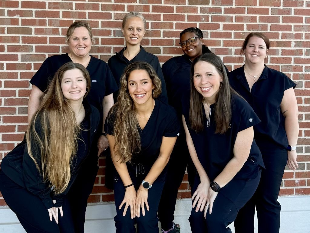 group photo of female dental staffs