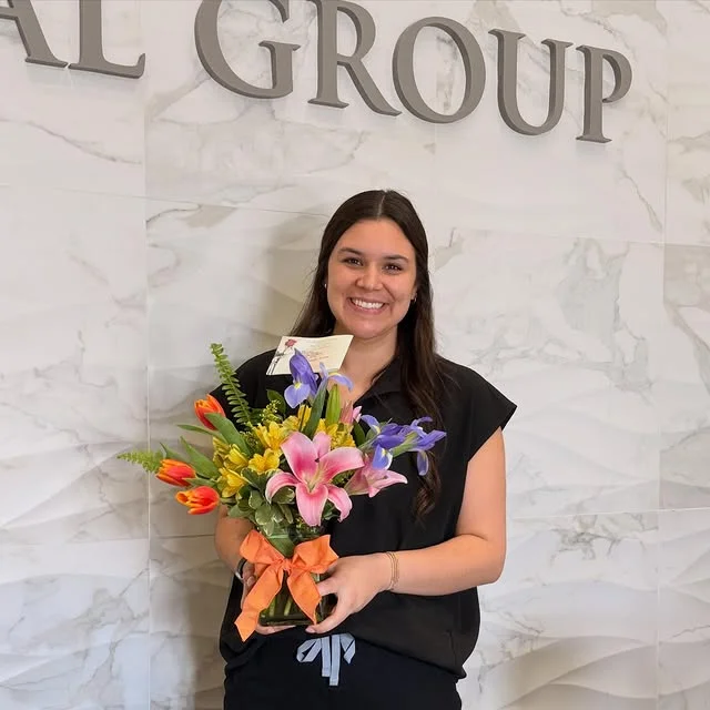 happy patient with flowers madison, ms
